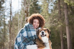 Woman and dog outdoors, winter